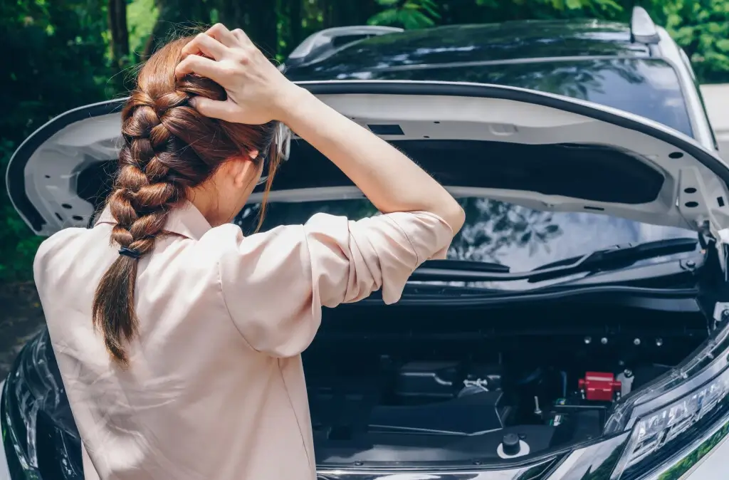 A woman shocked as she was hit by a parked car.