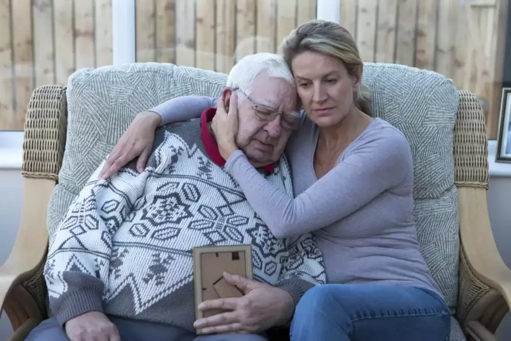 A woman holding her grandmother after suffering nursing home abuse in Washington D.C