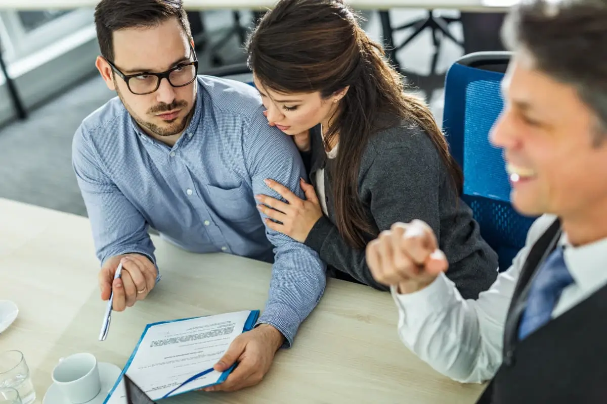 A conference meeting, determining how to know if your lawyer is selling you out.