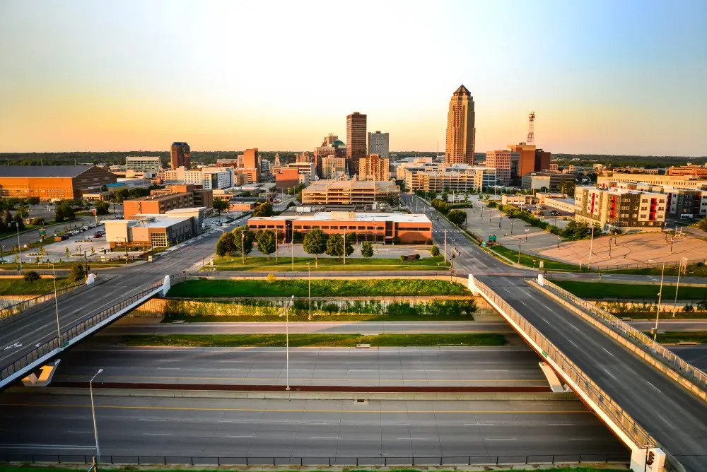 Iowa car accident laws, the De Moines skyline.